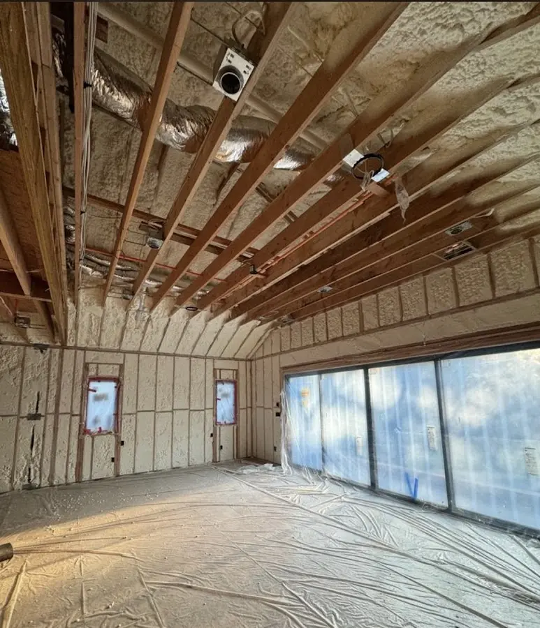 Interior walls and ceiling insulated with spray foam during new construction in Fruit Cove